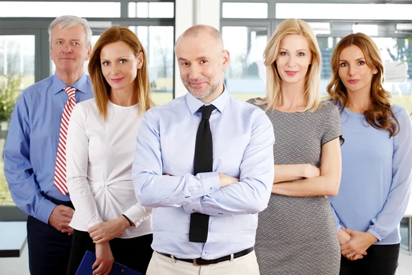 Mixed age businesswomen and businessmen at offce — Φωτογραφία Αρχείου