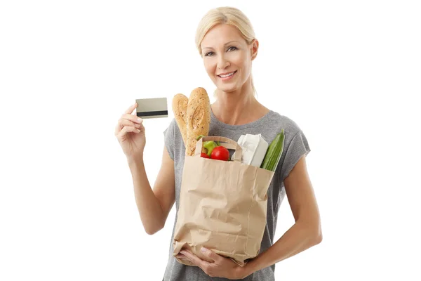 Shopping woman paying by card — Stock Photo, Image