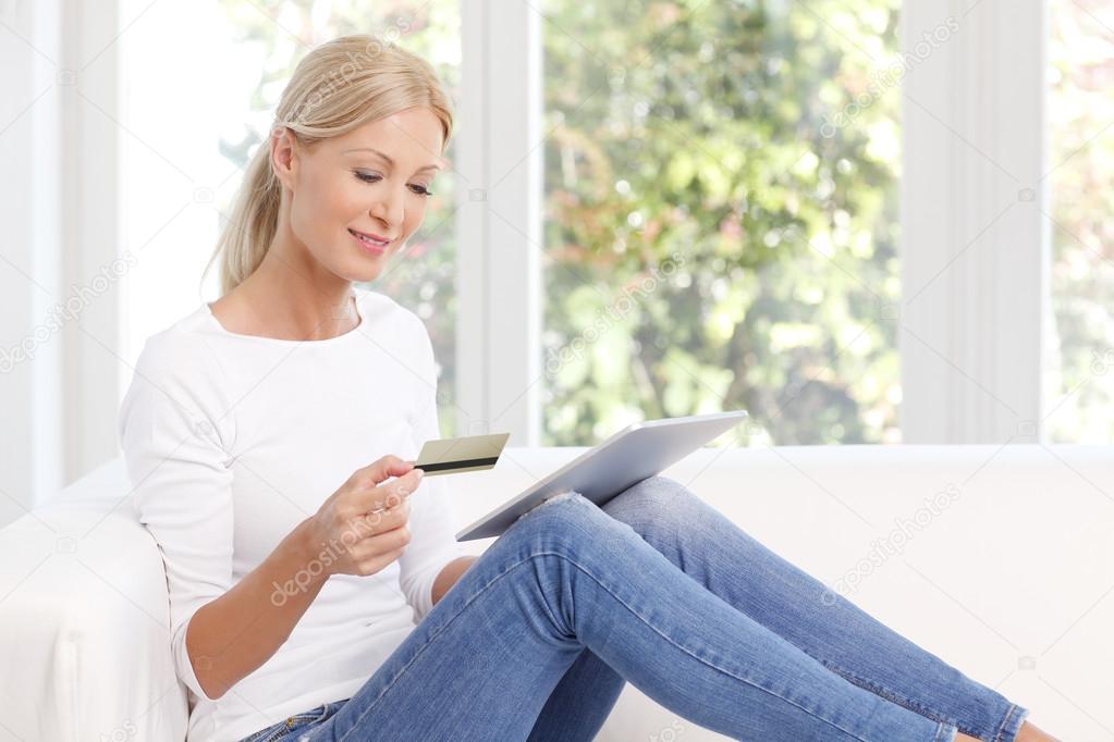 woman using tablet for online shopping