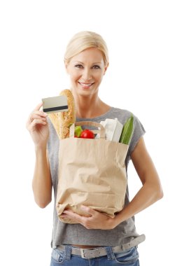 woman holding hand shopping paper bag