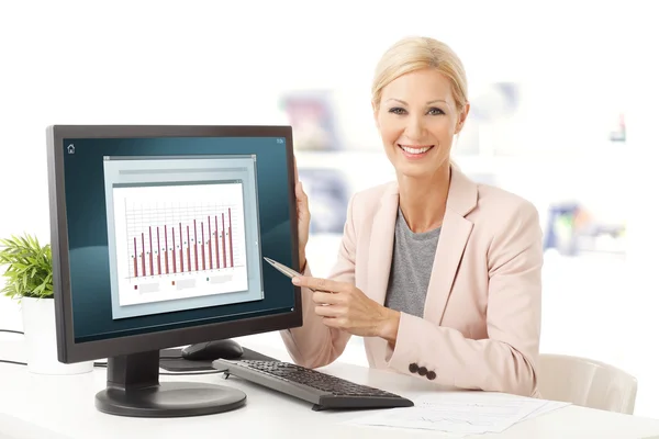 Financial assistant sitting at office — Stock fotografie