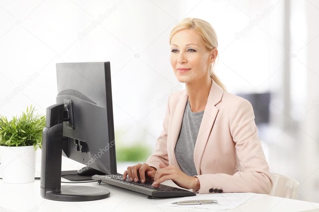 businesswoman sitting at office