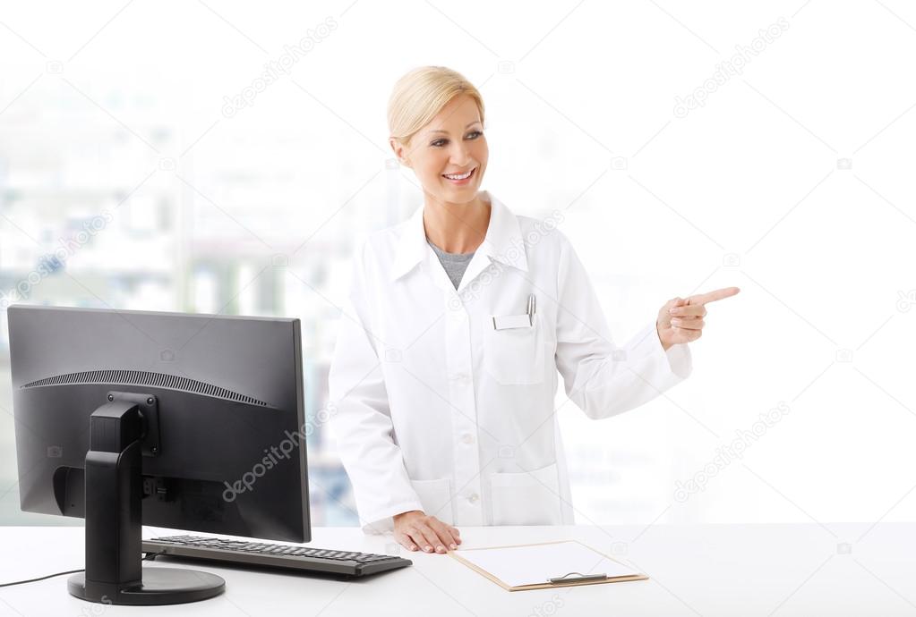 pharmacist woman standing at pharmacy