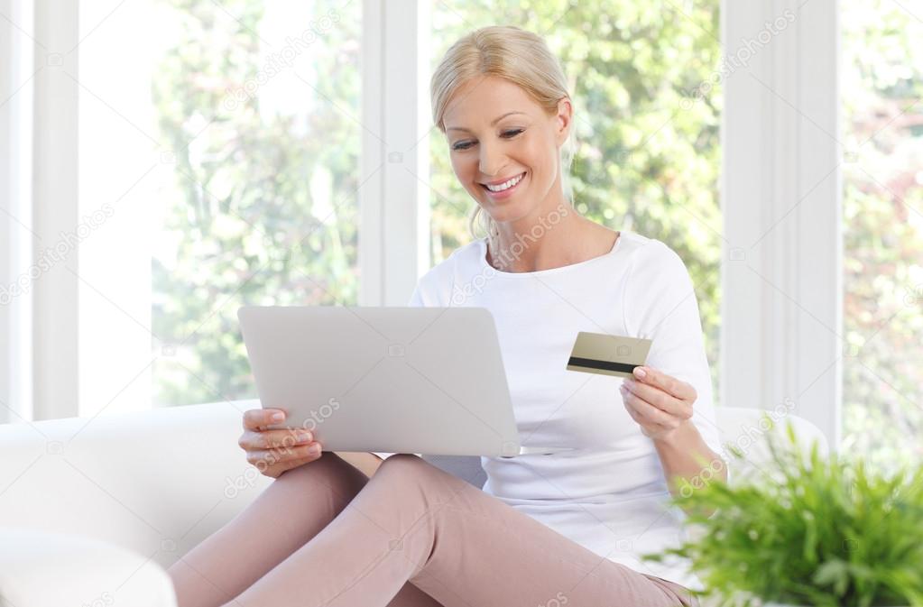 woman paying bills online