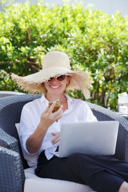 woman reading emails on phone