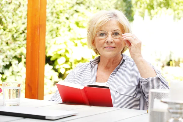 Senior woman relaxing at home — Stock Photo, Image