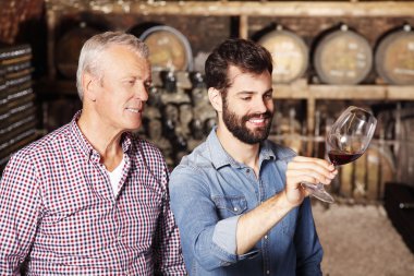 winemakers tasting the new wine