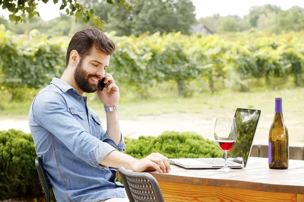 Wine estate owner sitting — 스톡 사진