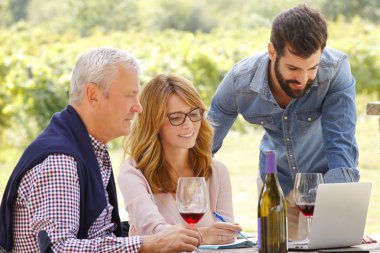 owner and winemaker consulting with  sommelier