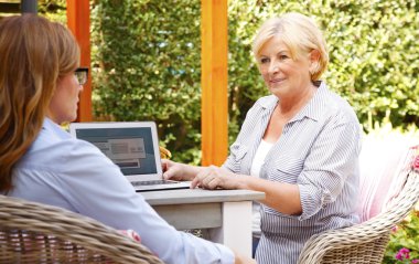 insurance agent consulting  retired woman