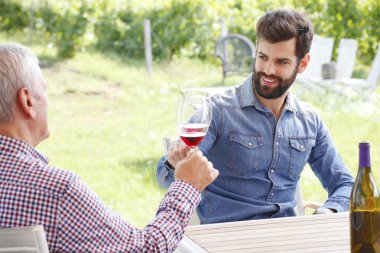 professional winemakers while tasting red wine