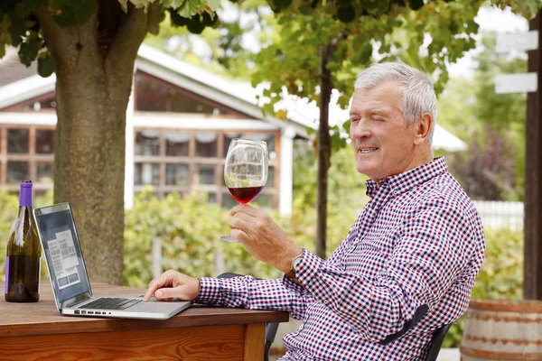 Sommelier holding in hand a glass — 스톡 사진