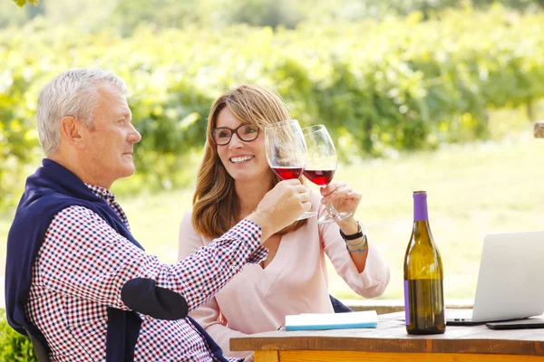 Winemaker and smiling sommelier woman — Stok fotoğraf