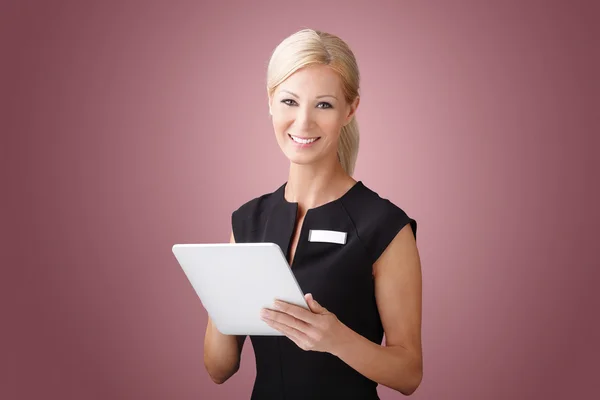 Sales woman holding tablet — Stok fotoğraf