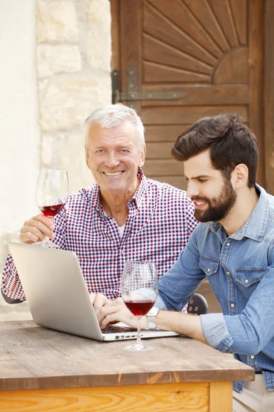 owner holding hand a glass