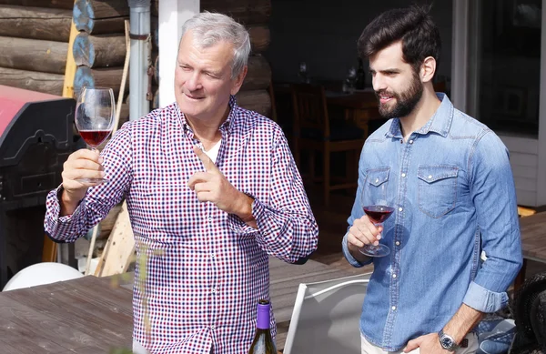 Winemaker and young sommelier standing — Stock Photo, Image