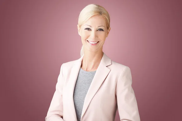 Middle age businesswoman smiling — Stok fotoğraf