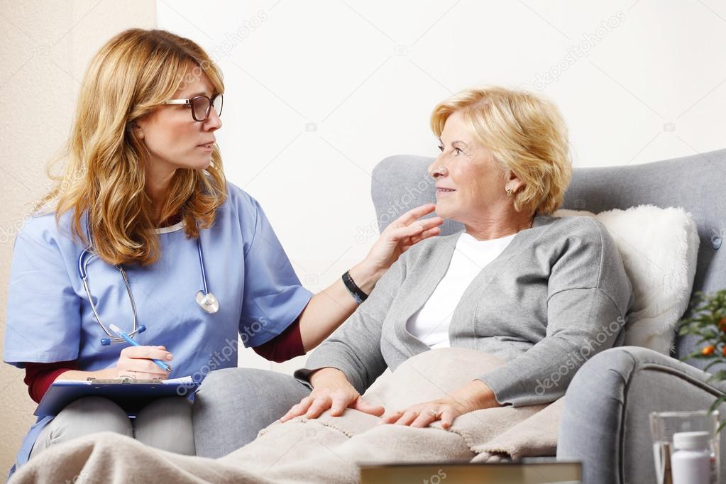 nurse holding in her hand clipboard