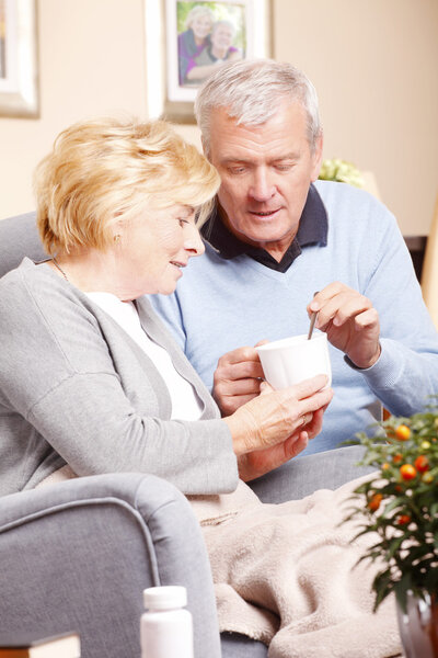 man giving medication