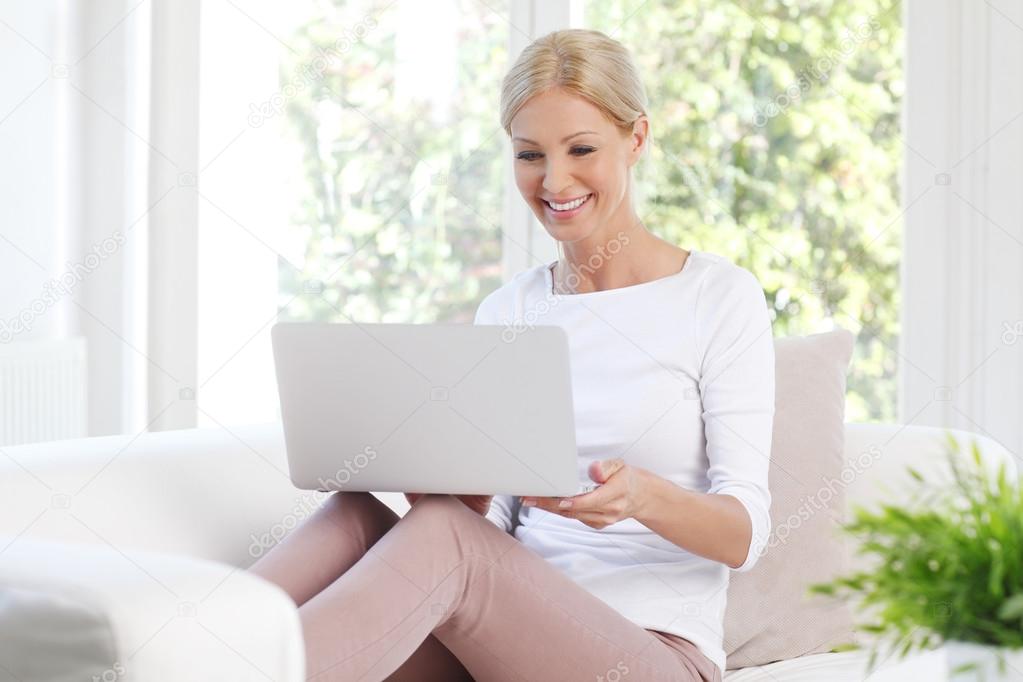 woman with laptop at home.