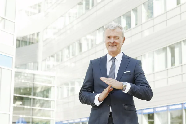 Businessman showing time out signal — Stock Photo, Image