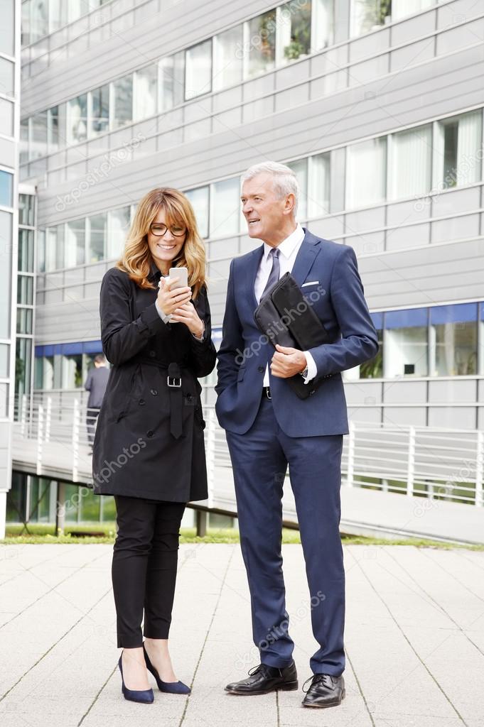 businesswoman holding phone