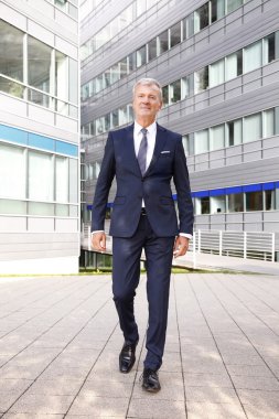 managing director walking