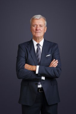 lawyer with arms crossed standing