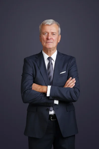 Lawyer with arms crossed standing — Stok fotoğraf