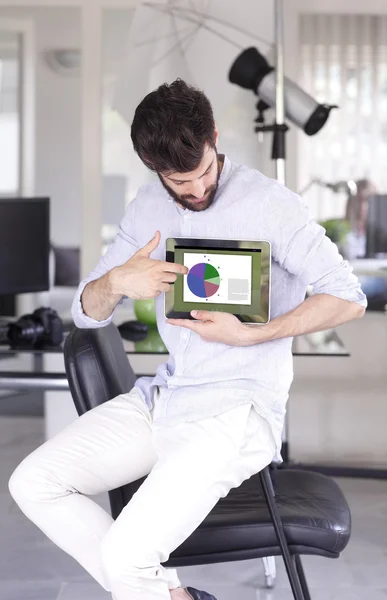 Financial assistant holding tablet — Stock Photo, Image