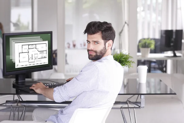 Real estate agent sitting — Stock Photo, Image