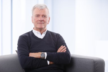 man sitting at living room