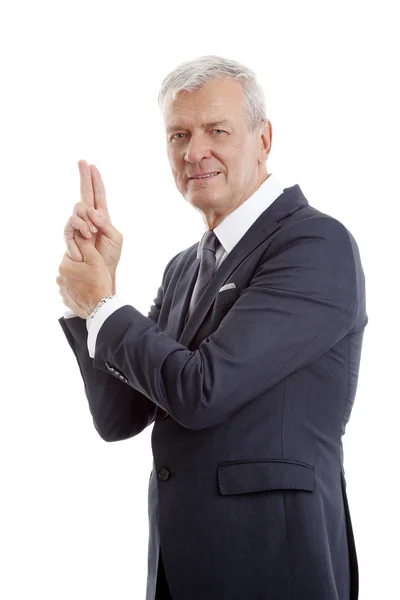 Hombre de negocios gesticulando un arma — Foto de Stock