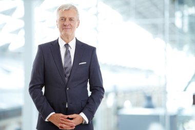 financial director standing at office