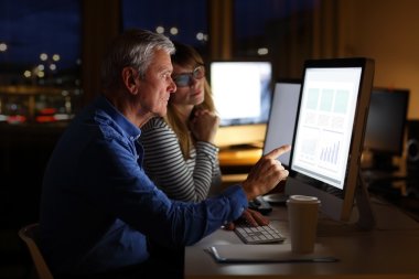 director and  businesswoman analyzing  data