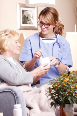 woman sitting  with caregiver