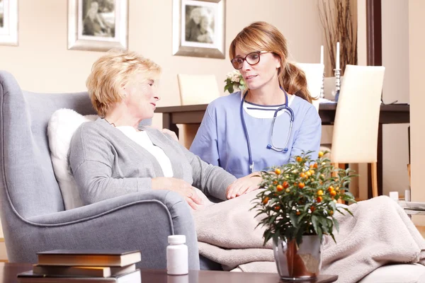 Caregiver giving helping hand. — Stock Photo, Image