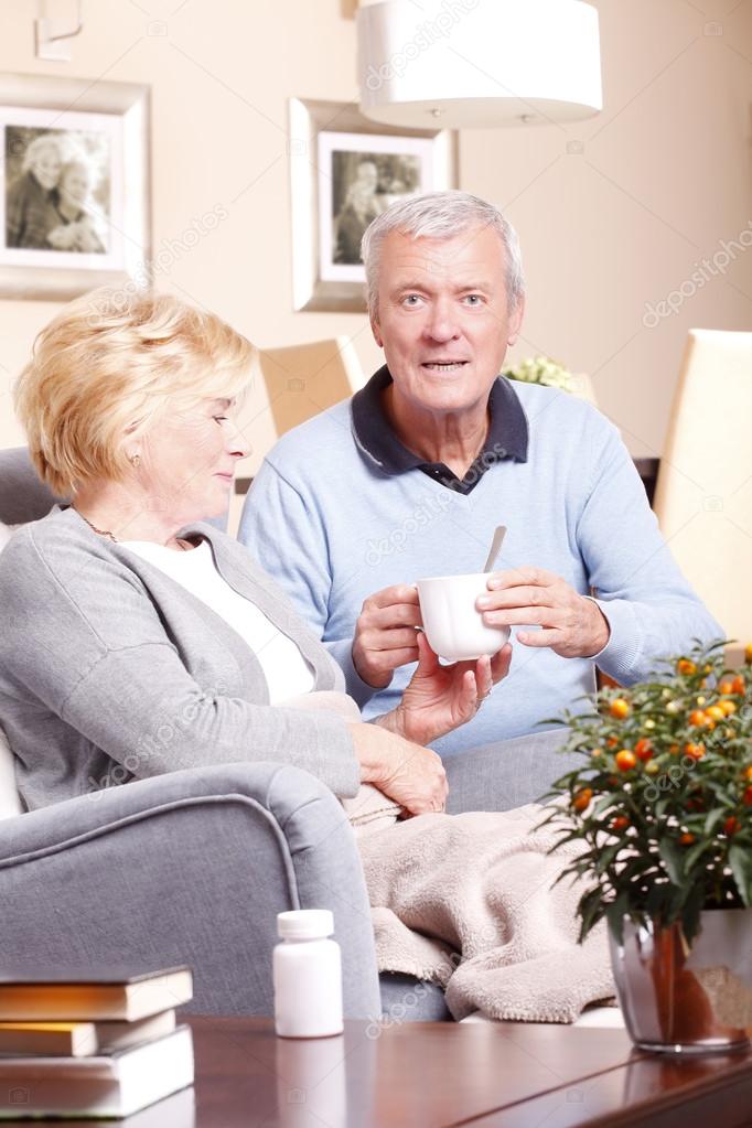 senior couple relaxing at home