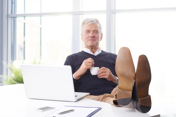 Sales man sitting in  office — Stok fotoğraf