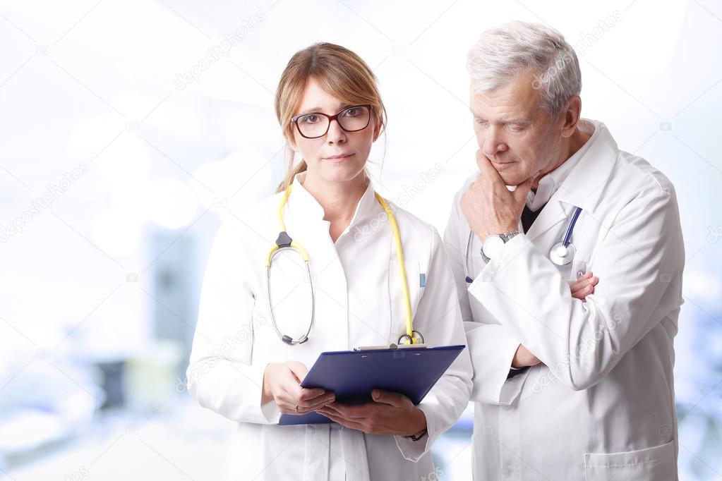 female doctor holding in her hand a clipboard