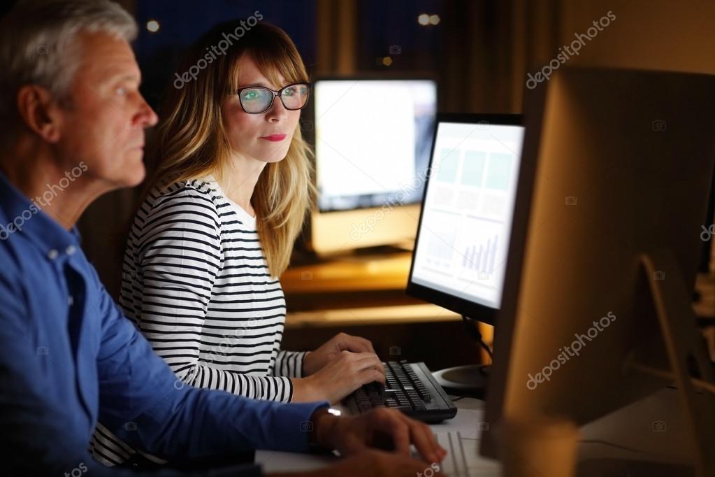 Financial Team Working Late — Stock Photo © Sepy #95274764 - 1023x682 - jpeg Team Working Late