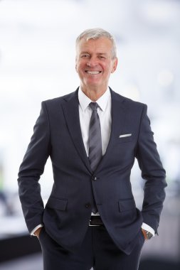 managing director standing