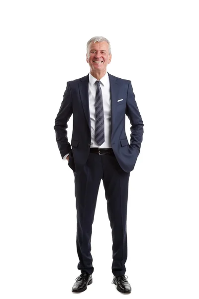 Smiling businessman standing — Stock Photo, Image