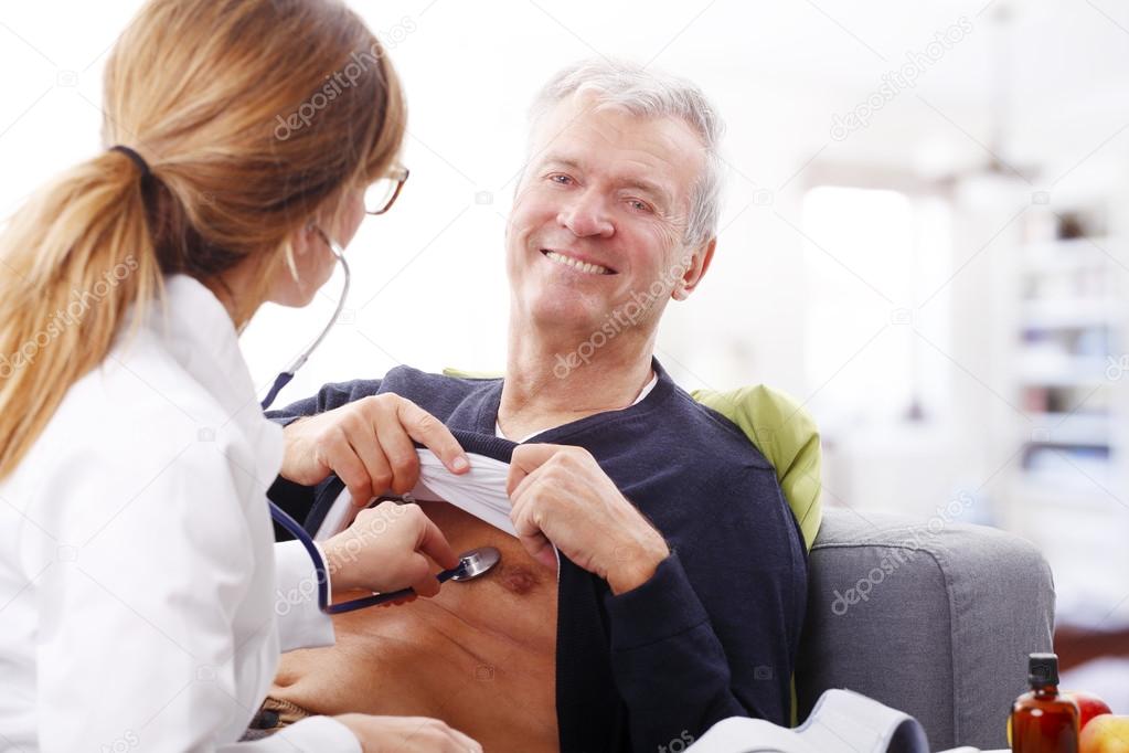 doctor checking the blood pressure
