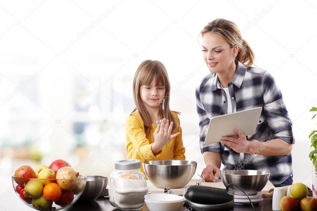 Mother reading recipe