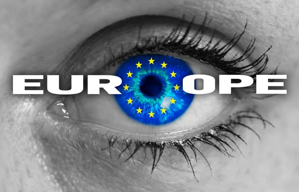 Europe eye looks through flag concept — Stock Photo, Image