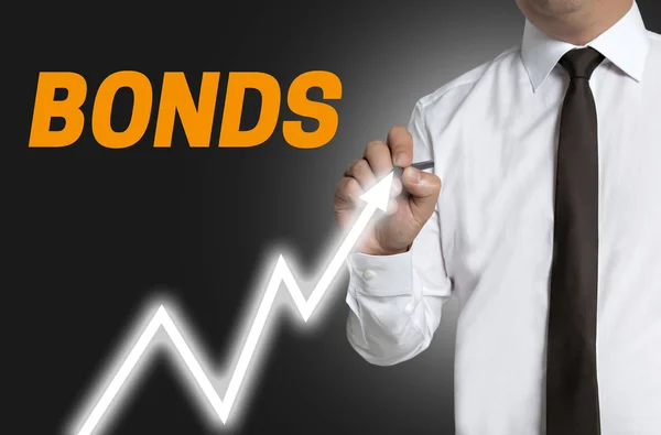 Bonds trader draws market price on touchscreen — Stock Photo, Image