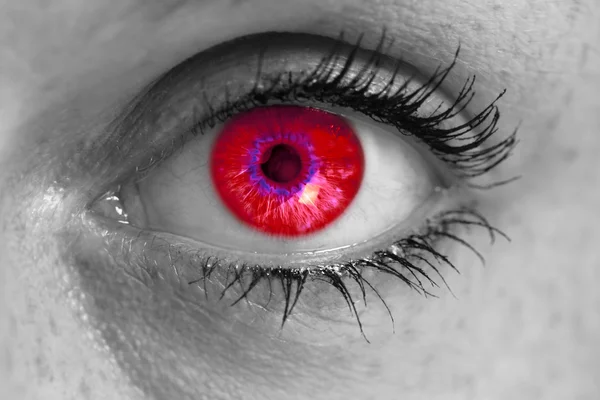 Eye with red iris looks at viewer concept macro — Stock Photo, Image
