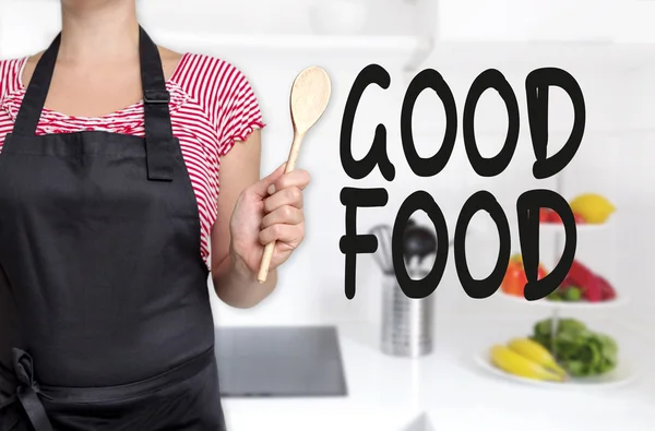 Buena comida cocinero sosteniendo concepto de fondo cuchara de madera —  Fotos de Stock