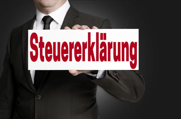 Steuererklaerung (w Niemiec zwrot podatku) znak jest w posiadaniu firmy — Zdjęcie stockowe
